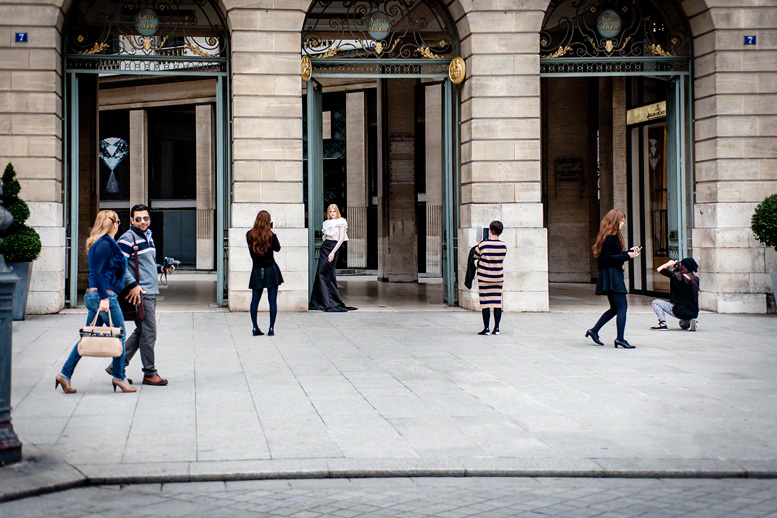 wide angle shot of a street scene from a high fashion shoot, editorial