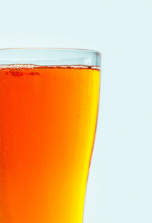 editorial colorful tight shot of a cold drink in a glass