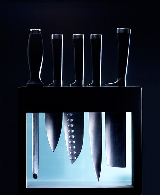 dramatic photo of knive set, product photo