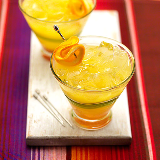 editorial photo of tequila cocktail on a colourful background