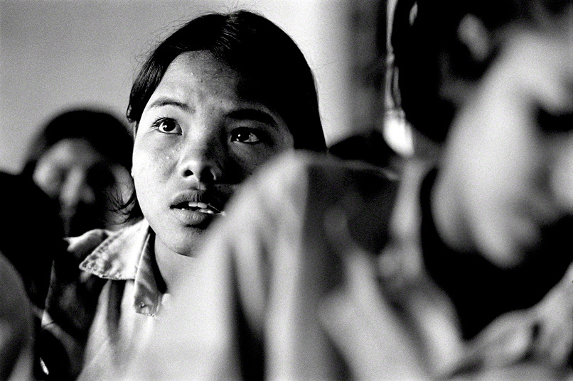 a closeup of female nepalese student in classroom environment