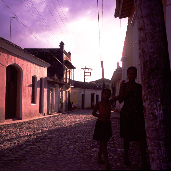 pink and purple hues saturate Trinidad de Cuba street